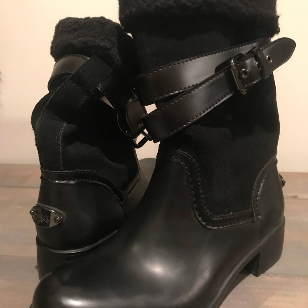 Coach boots never worn.